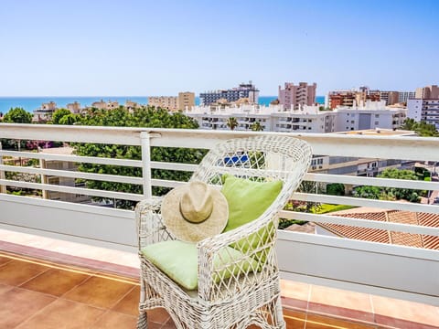 Property, Sky, Building, Outdoor Furniture, Urban Design, Grass, Leisure, Real Estate, Condominium, Wood