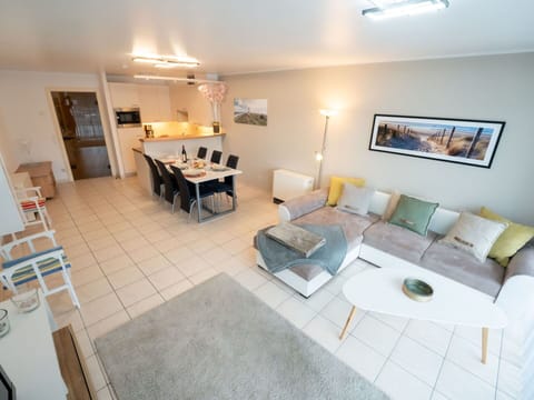 Table, Picture Frame, Couch, Lighting, Interior Design, Living Room, Flooring, Comfort, Floor, Wood