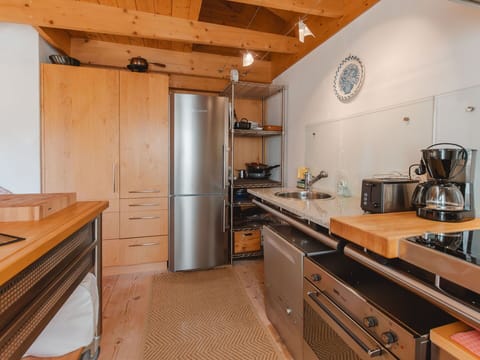 Cabinetry, Countertop, Property, Furniture, Kitchen Appliance, Home Appliance, Kitchen Stove, Drawer, Wood, Kitchen