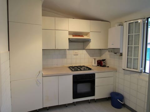 Cabinetry, Countertop, Window, Kitchen Appliance, Kitchen Stove, Home Appliance, Kitchen, Flooring, Floor, Major Appliance