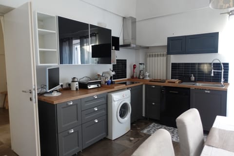 Deluxe Apartment, 2 Bedrooms | Private kitchen | Full-size fridge, microwave, oven, stovetop