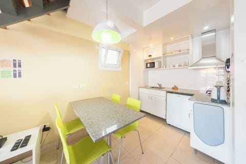 Duplex, 1 Bedroom | Private kitchen | Mini-fridge, microwave, coffee/tea maker, griddle