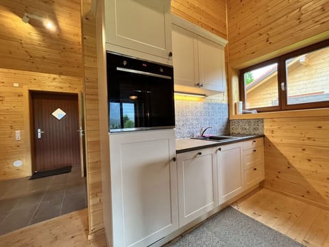 Cabinetry, Countertop, Building, Kitchen Sink, Kitchen Appliance, Window, Kitchen, Kitchen Stove, Wood, Interior Design