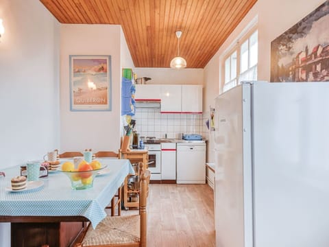 Furniture, Cabinetry, Property, Table, Countertop, Wood, Orange, Kitchen, Interior Design, Chair