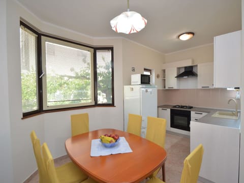 Table, Furniture, Property, Window, Cabinetry, Chair, Wood, Lighting, Interior Design