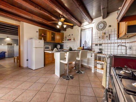 Property, Cabinetry, Table, Kitchen, Countertop, Wood, Interior Design, Building, Chair, Living Room