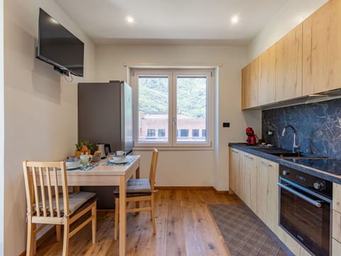 Cabinetry, Furniture, Countertop, Window, Kitchen Sink, Building, Sink, Wood, Flooring, Table