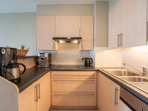 Cabinetry, Kitchen Sink, Countertop, Property, Sink, Kitchen Appliance, Kitchen, Kitchen Stove, Home Appliance, Wood