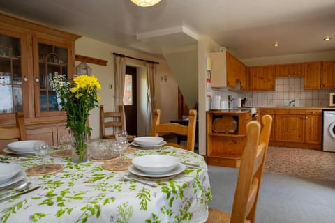 Dining area with round dining table and chairs