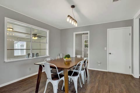 Large dining table can seat six.