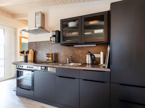 Cabinetry, Countertop, Tap, Kitchen Appliance, Kitchen Stove, Building, Kitchen, Wood, Shelving, Home Appliance