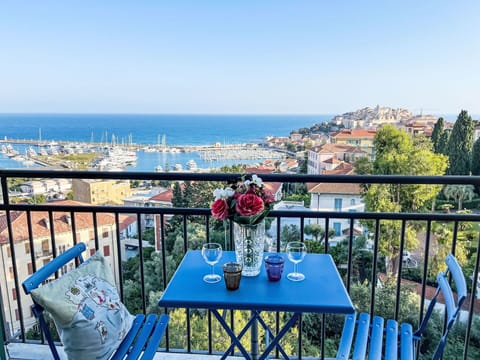 Sky, Table, Tableware, Property, Furniture, Building, Blue, Chair, Azure, Water