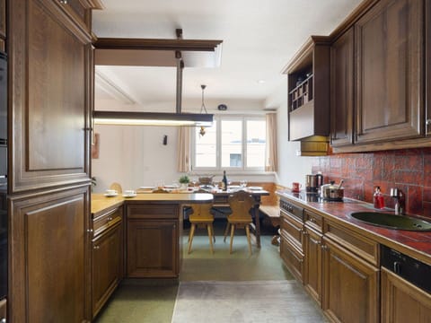 Cabinetry, Countertop, Kitchen, Flooring, Interior Design, Furniture, Wood, Light Fixture, Ceiling, Drawer