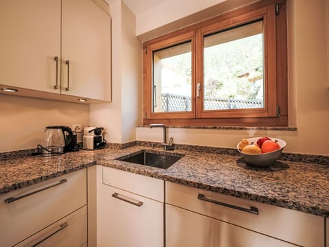 Kitchen, Countertop, Kitchen Sink, Kitchen Appliance, Wood, Major Appliance, Interior Design, Cabinetry, Plumbing Fixture, Sink