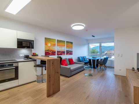 Furniture, Table, Wood, Lighting, Flooring, Chair, Building, Interior Design, Floor, Living Room