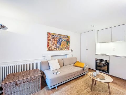 Furniture, Interior Design, Flooring, Floor, Couch, Wall, Room, Wood, Living Room, Wood Flooring