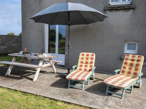 Furniture, Property, Umbrella, Plant, Table, Shade, Outdoor Furniture, Sky, Rectangle, Outdoor Table