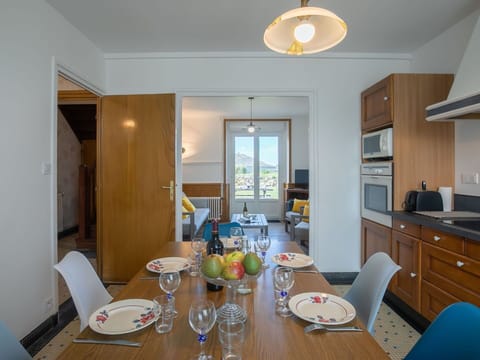 Table, Furniture, Property, Cabinetry, Chair, Tableware, Lighting, Interior Design, Wood, Dishware