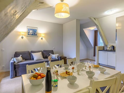 Table, Food, Property, Tableware, Furniture, Interior Design, Orange, Lighting, Couch, Chair