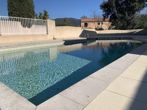 Water, Sky, Cloud, Property, Swimming Pool, Seaside Resort, Azure, Blue, Building, Outdoor Furniture
