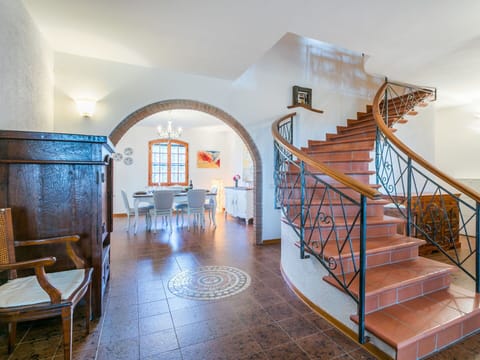 Furniture, Couch, Stairs, Building, Chair, Interior Design, Table, Floor, Flooring, Hall