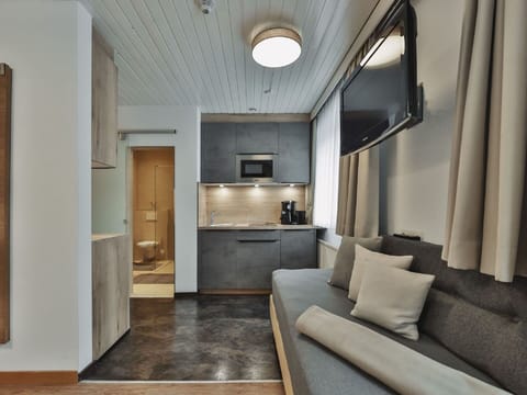 Furniture, Property, Couch, Comfort, Interior Design, Floor, Living Room, Building, Flooring, Wood