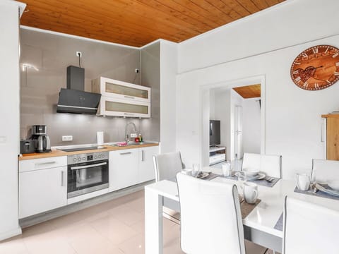 Furniture, Cabinetry, Countertop, Kitchen Stove, Kitchen, Building, Wood, Kitchen Appliance, House