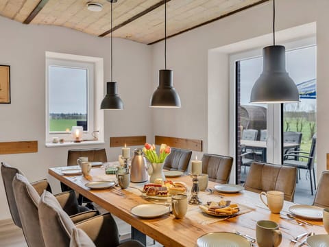 Furniture, Interior Design, Wood, Flooring, Ceiling, Light Fixture, Floor, Table, Chair, Kitchen & Dining Room Table