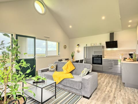 Property, Furniture, Plant, Cabinetry, Couch, Comfort, Interior Design, Lighting, Table, Living Room