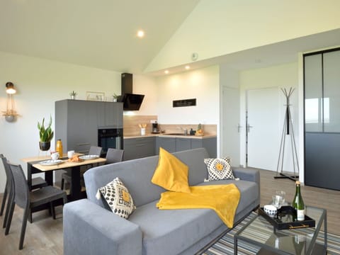 Table, Furniture, Couch, Property, Comfort, Living Room, Interior Design, Lighting, Houseplant, Studio Couch