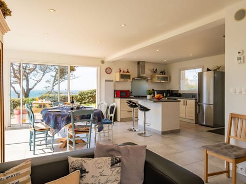 Table, Furniture, Property, Countertop, Cabinetry, Chair, Kitchen Appliance, Building, Kitchen, Interior Design