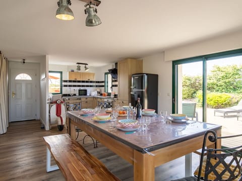 Table, Property, Furniture, Cabinetry, Wood, Interior Design, Lighting, Chair, Tableware, Window