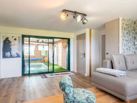 Property, Green, Azure, Wood, Couch, Lighting, Interior Design, Comfort, Flooring, Floor