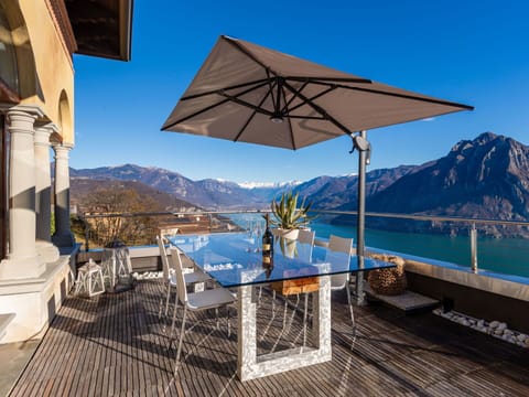 Water, Table, Sky, Property, Furniture, Azure, Shade, Chair, Lighting, Outdoor Furniture