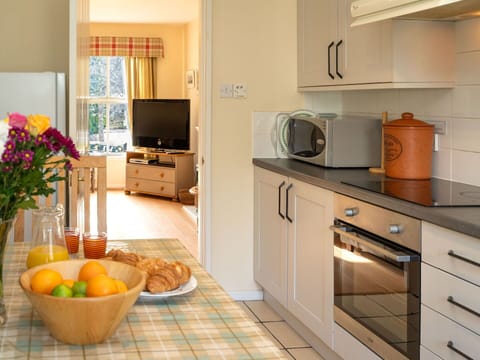 Cabinetry, Countertop, Property, Kitchen, Building, Kitchen Stove, Kitchen Appliance, Interior Design, Drawer, Home Appliance