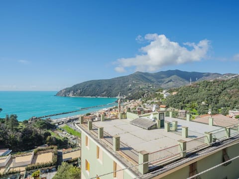 Sky, Water, Cloud, Building, Plant, Azure, Urban Design, Coastal And Oceanic Landforms, Tree, Mountain