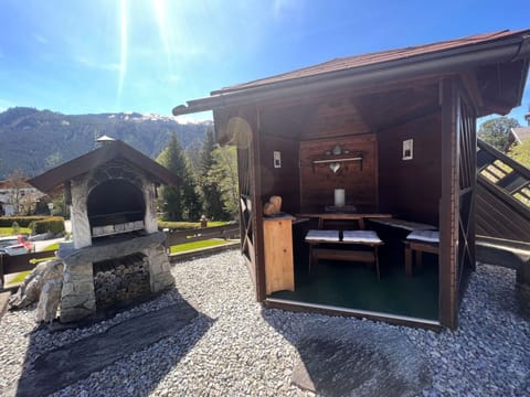 Sky, Property, Cloud, Building, Plant, Asphalt, Road Surface, Vehicle, Landscape, Tints And Shades