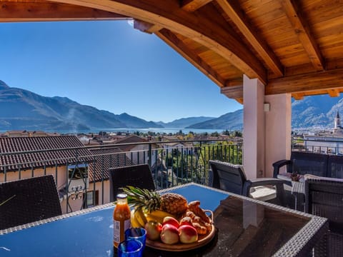 Sky, Table, Food, Property, Furniture, Tableware, Building, Mountain, Blue, Azure
