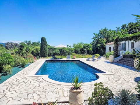 Blue, Swimming Pool, Resort, Flagstone, Shade, Garden, Landscaping, Outdoor Furniture, Estate, Water Feature