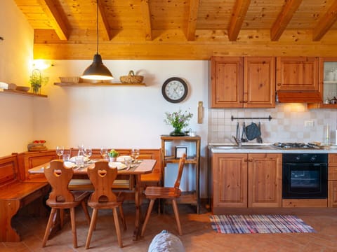 Furniture, Table, Sky, Chair, Wood, Interior Design, Tree, Floor, Shade, Building