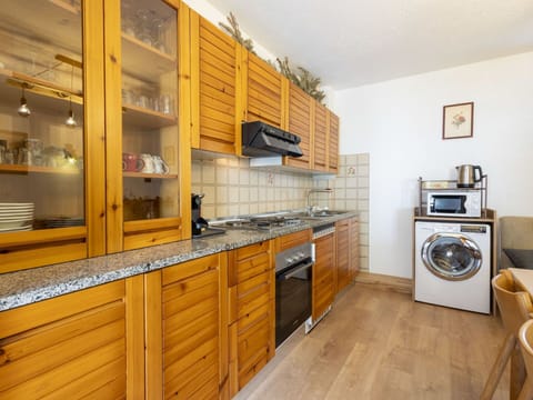 Kitchen, Cabinetry, Flooring, Countertop, Furniture, Major Appliance, Wood, Interior Design, Kitchen Appliance, Floor