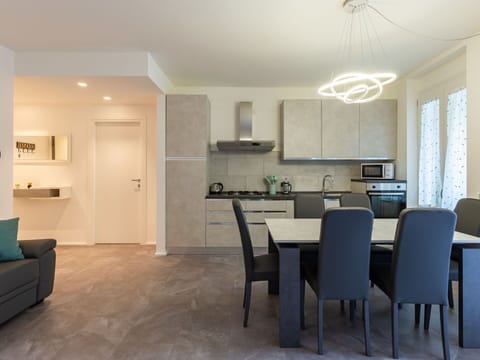 Furniture, Property, Cabinetry, Countertop, Building, Chair, Table, Wood, Couch, Window