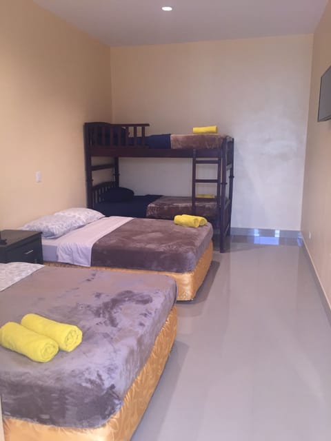 Family Studio Suite, 1 Bedroom, Private Bathroom | Desk, free WiFi, bed sheets