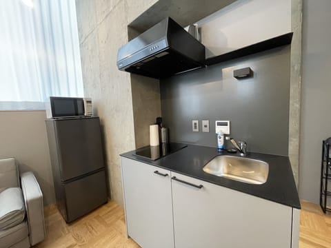 Basic Studio, Non Smoking, Balcony | Private kitchen | Full-size fridge, microwave, stovetop, electric kettle