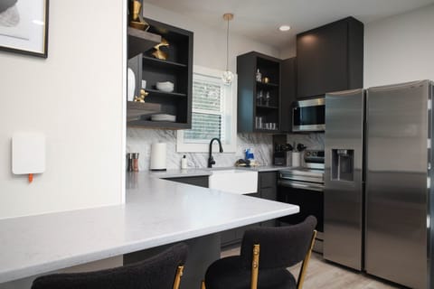 Another view of the full sized kitchen