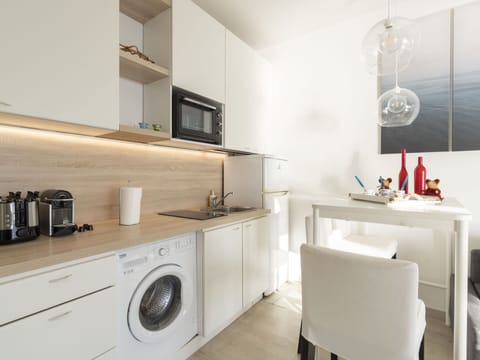 Sky, Water, Cloud, Beach, Umbrella, Outdoor Furniture, Shade, Coastal And Oceanic Landforms