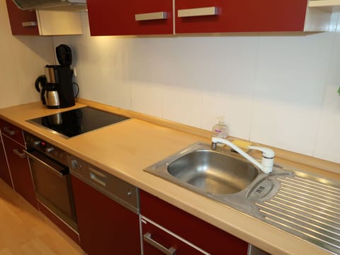 Countertop, Kitchen Sink, Cabinetry, Sink, Property, Tap, Furniture, Kitchen, Plumbing Fixture, Wood