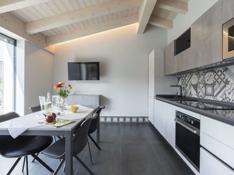 Furniture, Cabinetry, Window, Countertop, Kitchen Stove, Gas Stove, Kitchen Appliance, Kitchen, Cooktop, Table