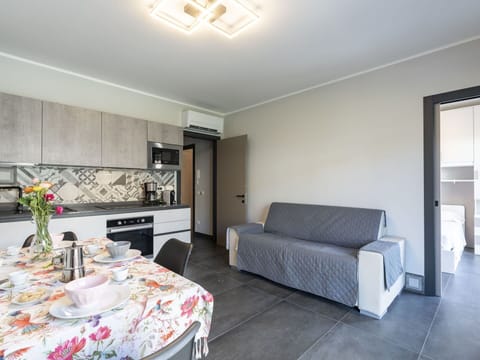 Furniture, Table, Interior Design, Plant, Couch, Flooring, Floor, Flower, Wood, Living Room