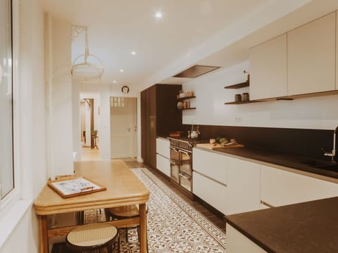 Cabinetry, Furniture, Property, Countertop, Table, Building, Sink, Wood, Kitchen, Chair